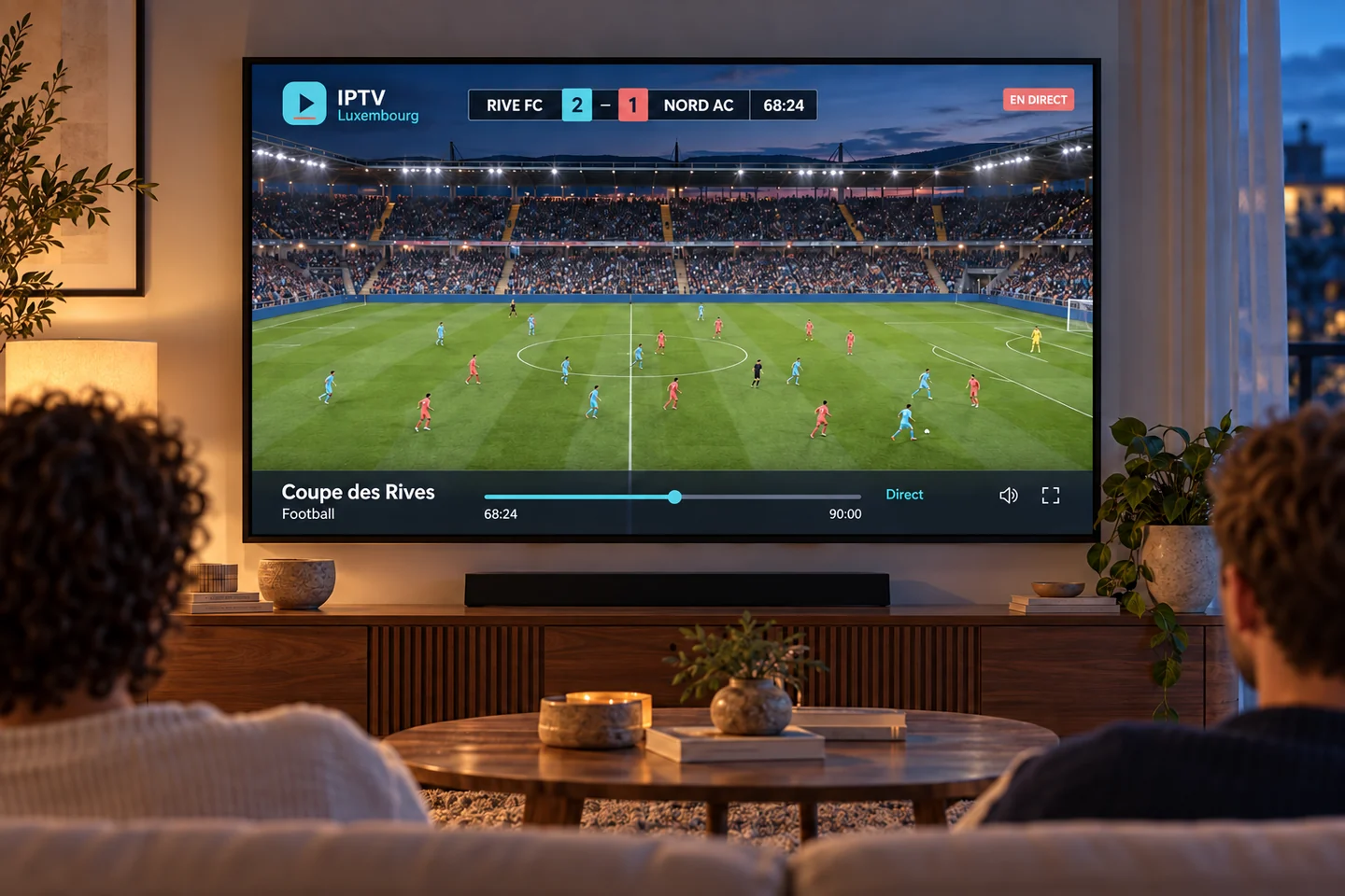 Deux personnes regardent une retransmission fictive de football entre Rive FC et Nord AC.